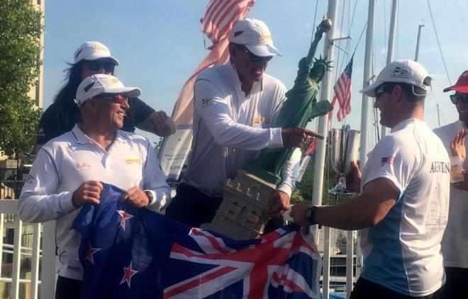 The winning team from the Royal Akarana Yacht Club in New Zealand receives the Statue of Liberty perpetual trophy – 11th International Yacht Club Challenge © Manhattan Yacht Club